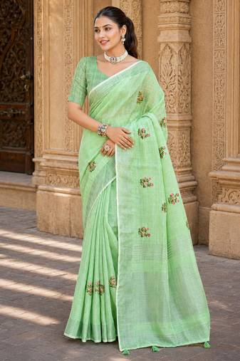 pista green linen woven work traditional saree