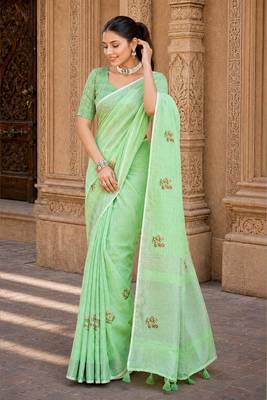 pista green linen woven work traditional saree 3