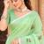 pista green linen woven work traditional saree