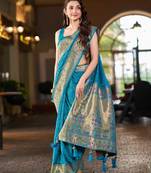 Teal blue patola Silk Blend saree with woven zari border & tassels