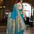 Teal blue patola Silk Blend saree with woven zari border & tassels