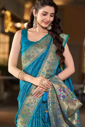 Teal blue patola Silk Blend saree with woven zari border & tassels