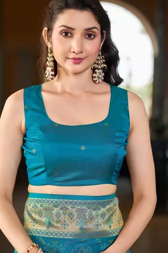 Teal blue patola Silk Blend saree with woven zari border & tassels