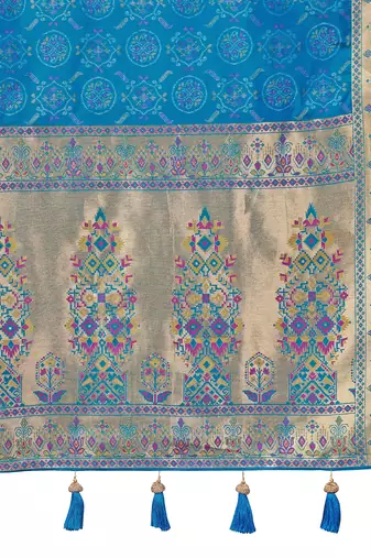 Teal blue patola Silk Blend saree with woven zari border & tassels