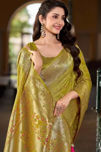 Olive green patola Silk Blend saree with woven zari border tassels