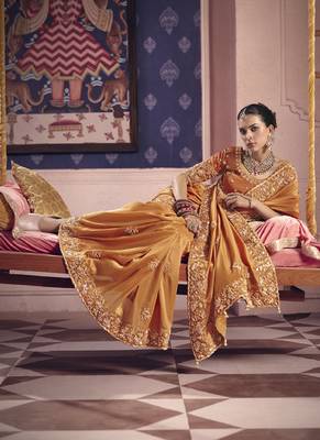 orange tissue heavy embroidery designer saree 4