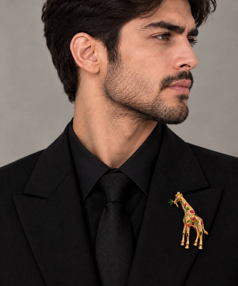 Elegant gold-plated giraffe brooch with multicolor stone embellishments