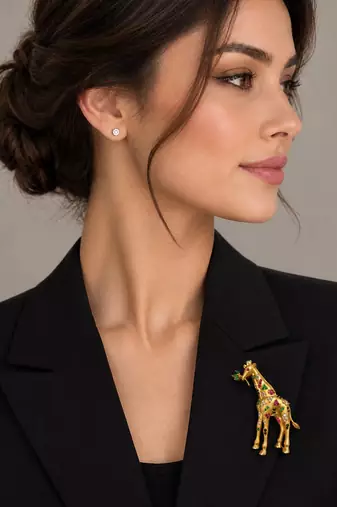 Elegant gold-plated giraffe brooch with multicolor stone embellishments
