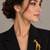 Elegant gold-plated giraffe brooch with multicolor stone embellishments