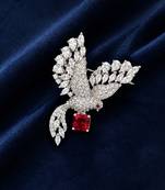 Elegant peacock design brooch with red stone and crystal studded detailing