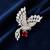 Elegant peacock design brooch with red stone and crystal studded detailing