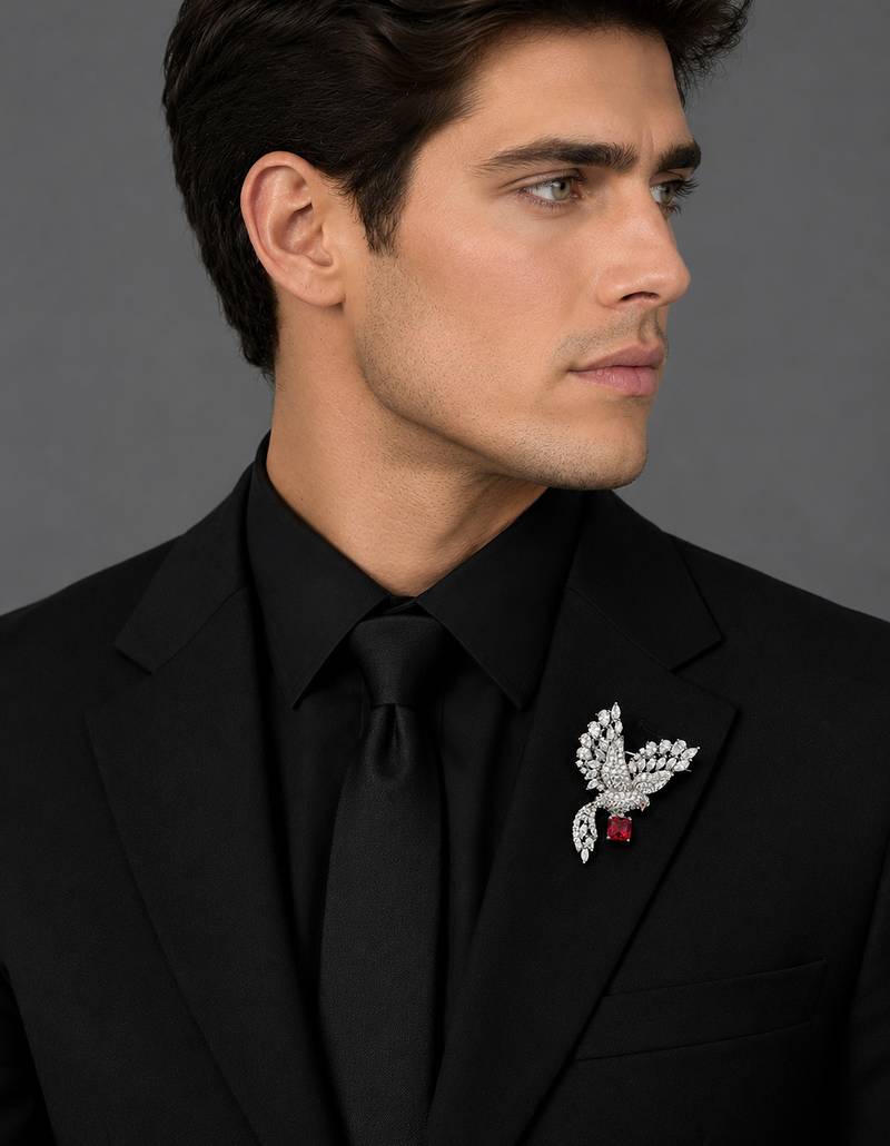 Elegant peacock design brooch with red stone and crystal studded detailing