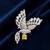 Elegant peacock design brooch with yellow stone and crystal studded detailing
