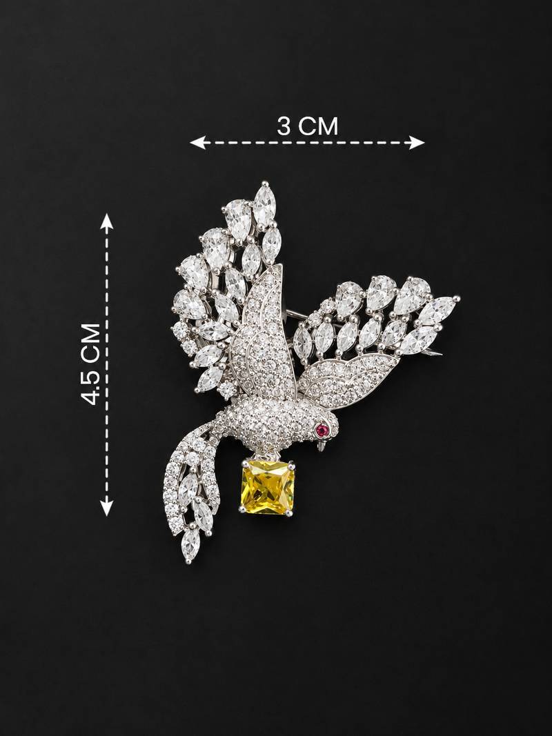 Elegant peacock design brooch with yellow stone and crystal studded detailing