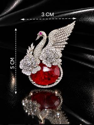 Elegant swan brooch with red crystal and wing shaped cz stone detailing 3