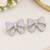 Silver-Tone Bow Stud Earrings with Sparkling CZ Stones