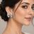 Silver-Tone Bow Stud Earrings with Sparkling CZ Stones