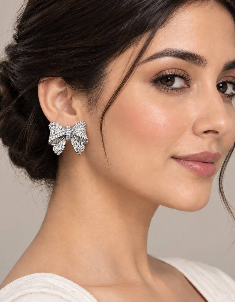 Silver-Tone Bow Stud Earrings with Sparkling CZ Stones