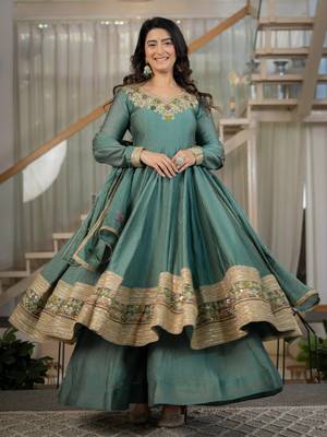 Women’s teal green anarkali gown with heavy embroidered border & palazzo set 1