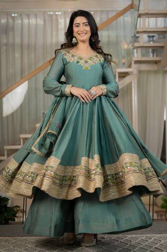 Women’s teal green anarkali gown with heavy embroidered border & palazzo set