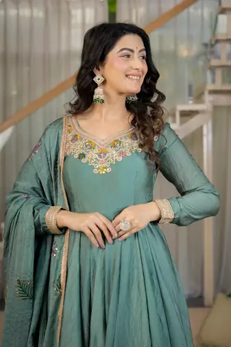 Women’s teal green anarkali gown with heavy embroidered border & palazzo set