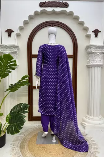 Purple printed anarkali kurta set with embroidered neckline and dupatta