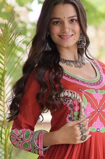 Rust kora cotton with multi thread embroidered and real mirror work navratri gown