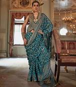 turquoise blue p.v. checks zari work with burnout soft finish bollywood saree