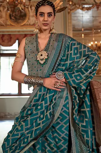 turquoise blue p.v. checks zari work with burnout soft finish bollywood saree