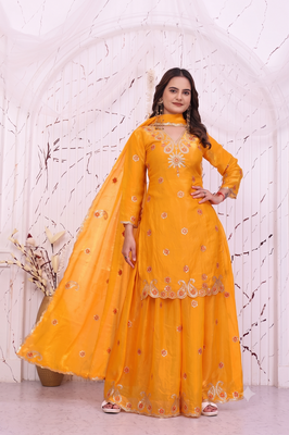 Women's yellow cutwork border kurti with palazzo pants & scalloped dupatta 1