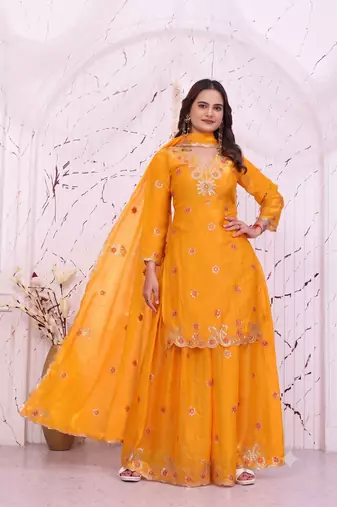 Women's yellow cutwork border kurti with palazzo pants & scalloped dupatta