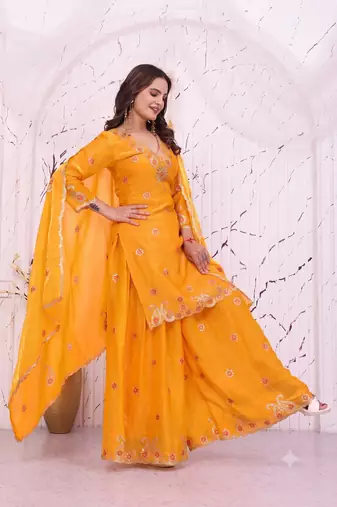 Women's yellow cutwork border kurti with palazzo pants & scalloped dupatta