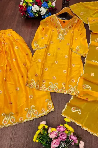 Women's yellow cutwork border kurti with palazzo pants & scalloped dupatta