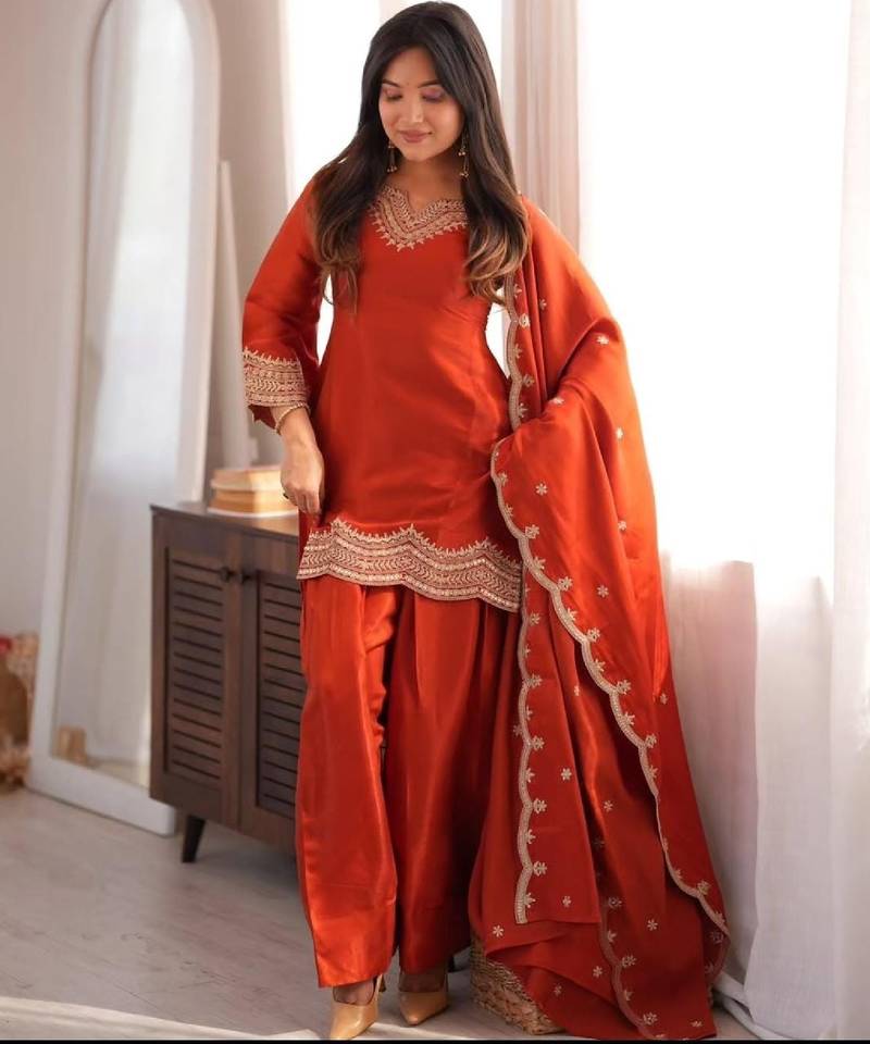 Orange silk blend straight embroidered kurta set for women with dupatta and pant
