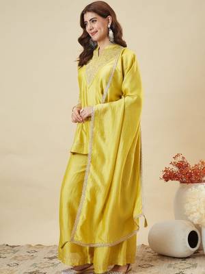 Women's yellow silk blend embroidered kurta set with dupatta and palazzo 3