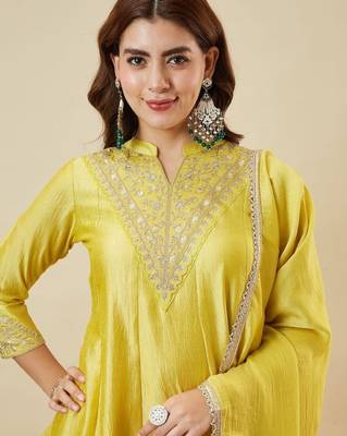 Women's yellow silk blend embroidered kurta set with dupatta and palazzo 5