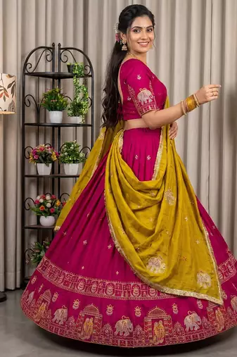 Women's Rani Pink Traditional Navratri Chaniya Choli with Border Embroidery & Heavy Contrast Yellow Dupatta Set