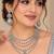 Pista mehandi-plated agate stone necklace set with earrings & maang tikka