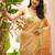 esha linen saree with lotus weave and hand embroidery