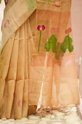 esha linen saree with lotus weave and hand embroidery 2