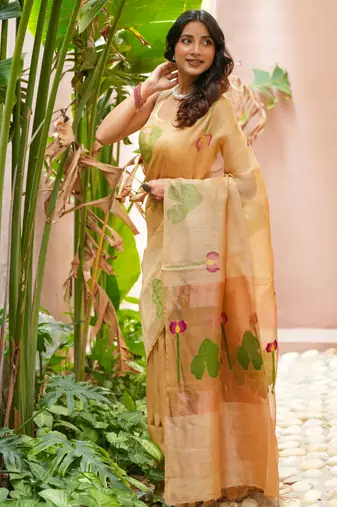 esha linen saree with lotus weave and hand embroidery