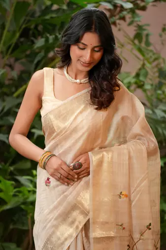neera linen with zari weaving and hand embroidery