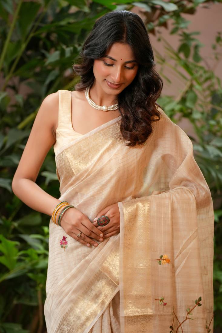 neera linen with zari weaving and hand embroidery
