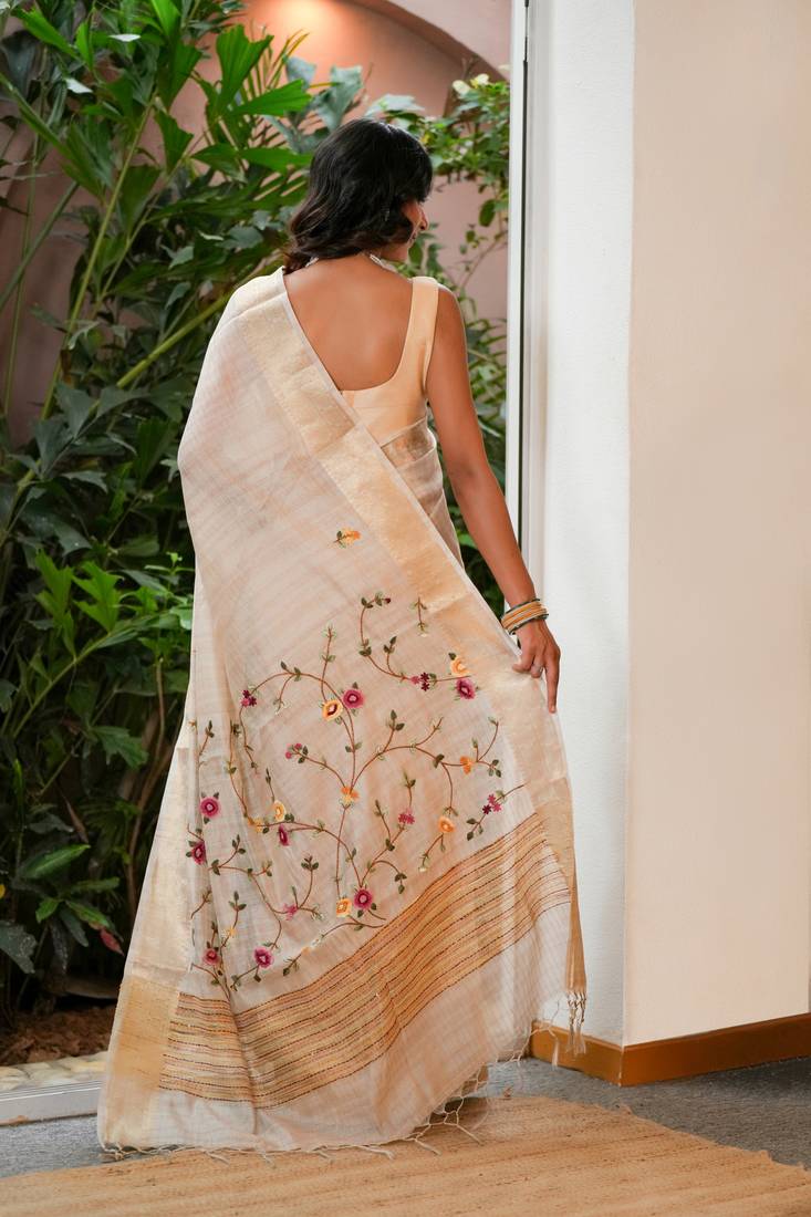 neera linen with zari weaving and hand embroidery