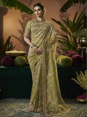 Designer green tissue fabric saree with green tissue blouse fabric 1