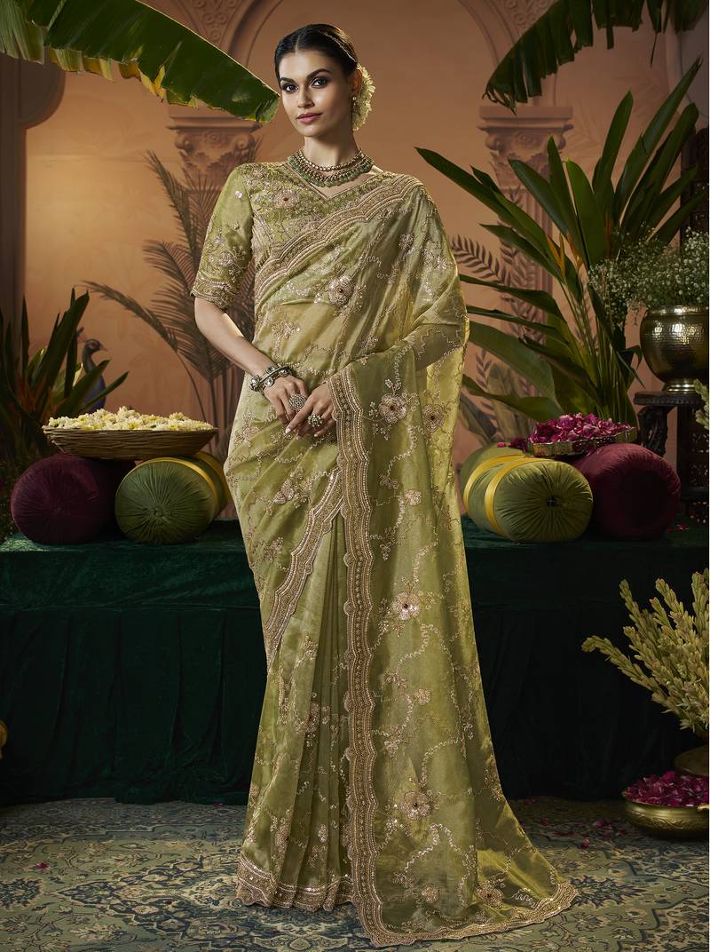 Designer green tissue fabric saree with green tissue blouse fabric