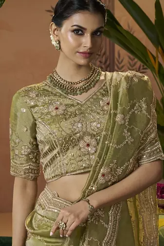 Designer green tissue fabric saree with green tissue blouse fabric
