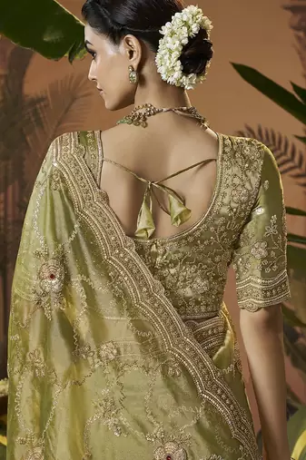 Designer green tissue fabric saree with green tissue blouse fabric