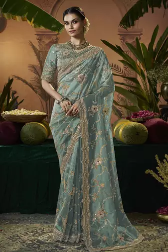 Designer sea green tissue fabric saree with green tissue blouse fabric