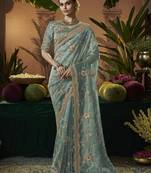 Designer sea green tissue fabric saree with green tissue blouse fabric